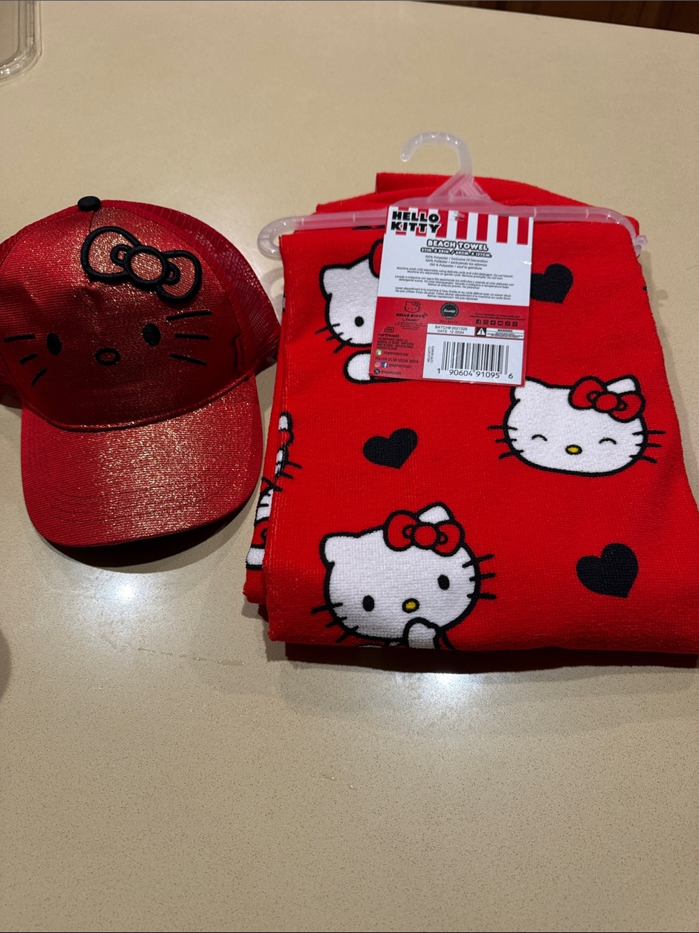 Hello Kitty Red and Black Character trucker hat and Beach towel. BNWT